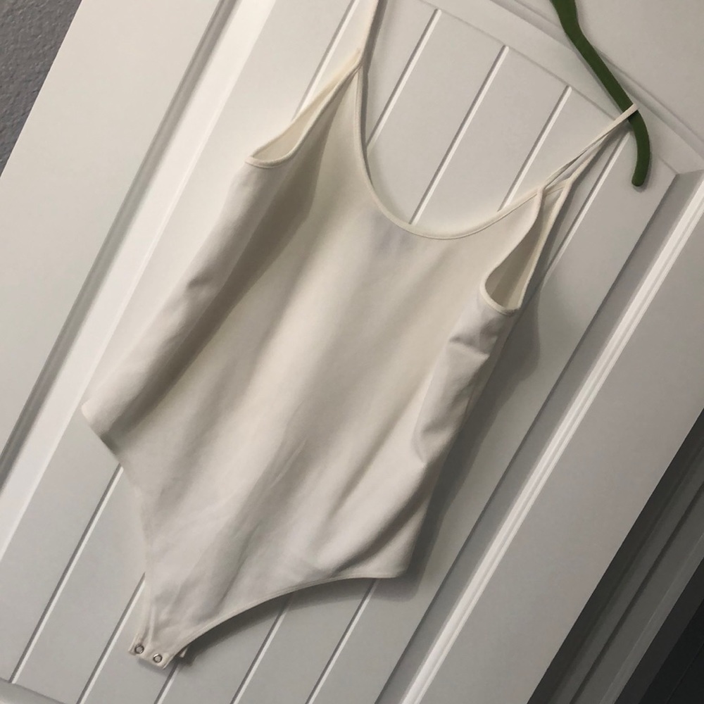 White thong body suit